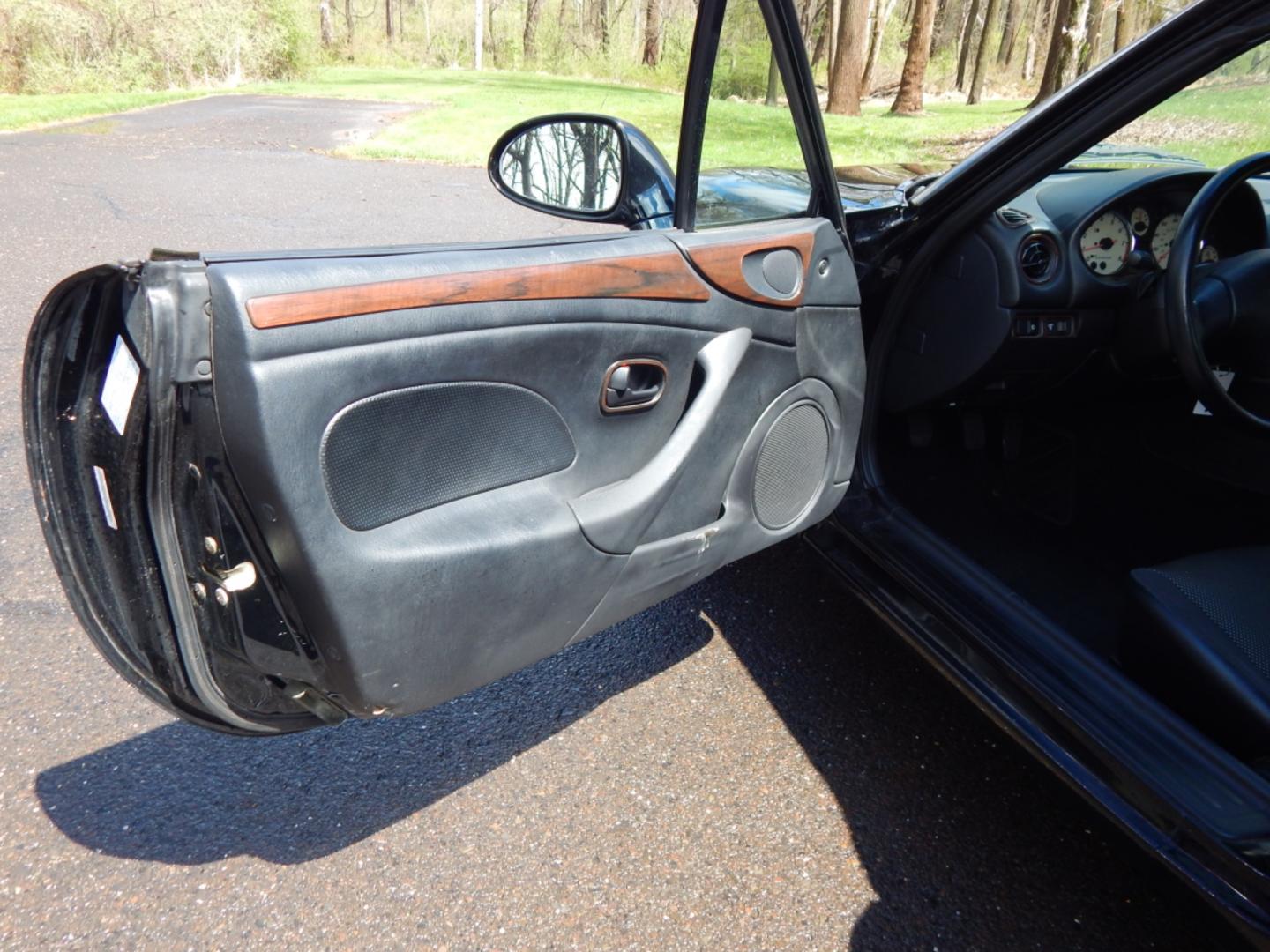 2002 Black /Black Cloth Mazda MX-5 Miata base (JM1NB353920) with an 1.8 liter 4 cylinder engine, 5 speed manual transmission, located at 6528 Lower York Road, New Hope, PA, 18938, (215) 862-9555, 40.358707, -74.977882 - Here for sale is a very fun 2002 Mazda MX-5 Miata. Under the hood is a strong running 1.8 liter 4 cylinder which puts power to the rear wheels via a solid shifting 5 speed manual transmission. Features include; Black cloth interior, wood grain trim, cold AC, power windows, AM/FM/CD, heated rear wi - Photo#14